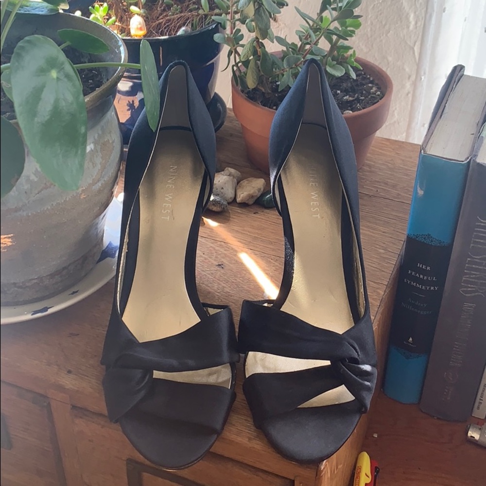 Nine West black satin d’orsay heels.